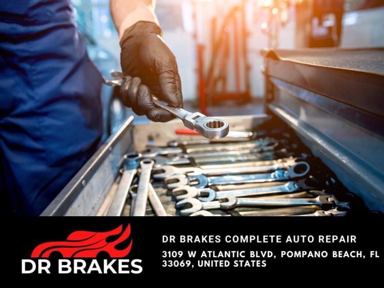Mechanic performing auto repair services at Dr. Brakes Complete Auto Repair in Palm Beach County, FL